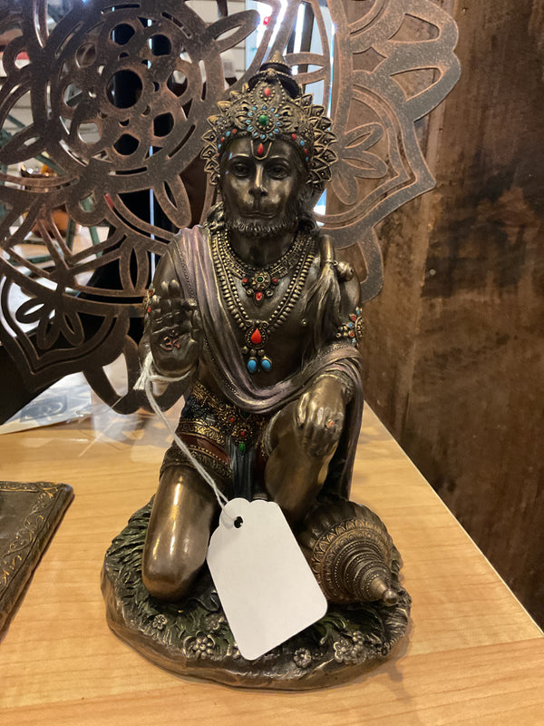 Kneeling statue