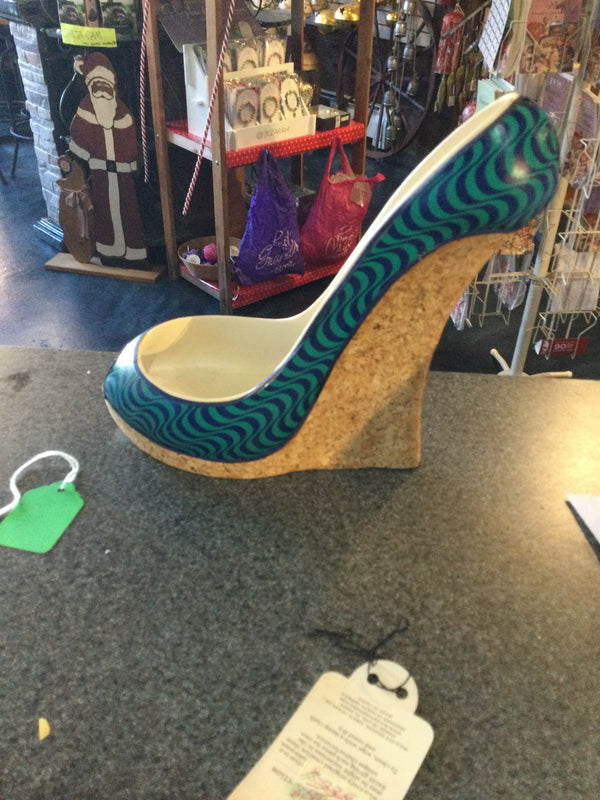 Soporte para vino con forma de zapato